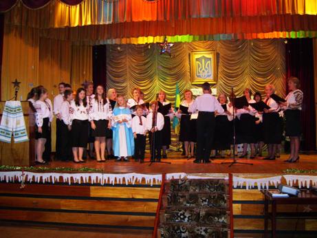 Mixed choir and children sing carols