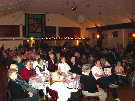 A full hall enjoying the play and songs