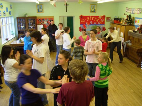 School hall full of dancers