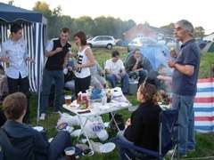 Visitors from Bradford enjoy a BBQ between the concert and zabava
