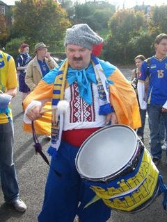 Volodymyr Hnatiw, 41, from Coventry, England keeps the beat for the Ukraine fans.